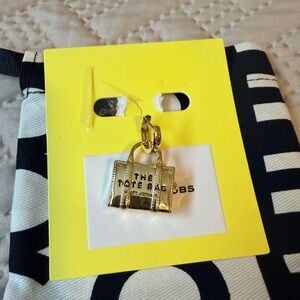 One side of Marc Jacob earrings